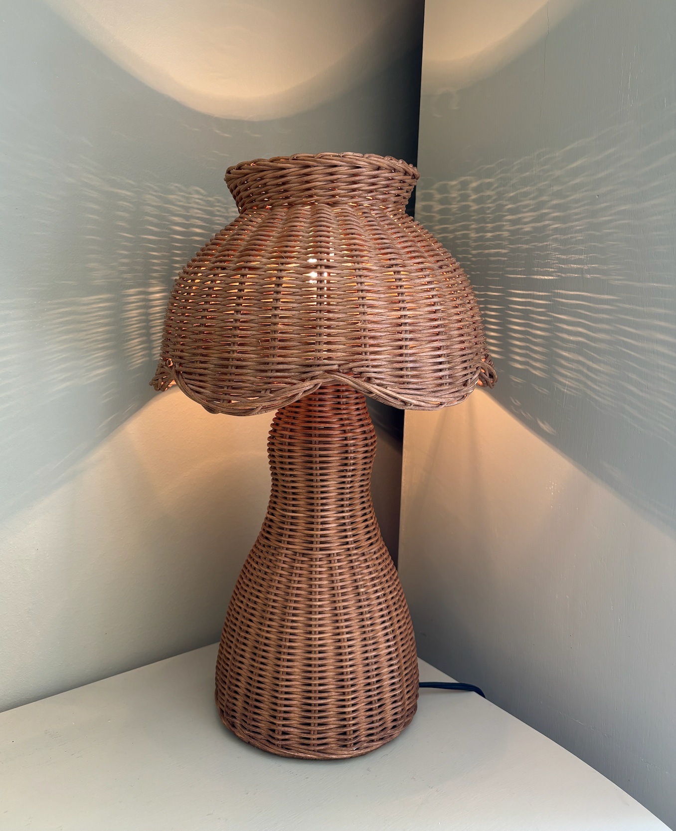 Scalloped rattan lamp